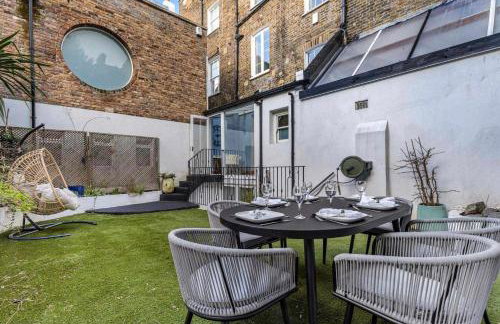 Beautiful 3-Bedroom House with Garden and Rooftop Retreat - Foto 15