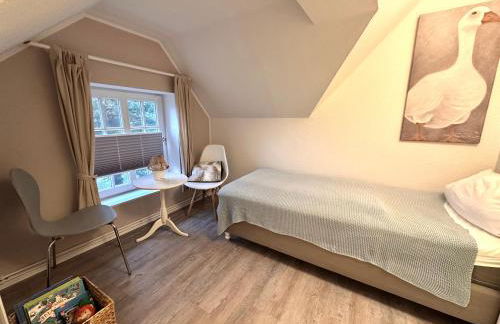 Sky & Sand Homes Strandläufer I Stilvolle Wohnung unter Reet in SPO mit Parkgarten - Photo 11