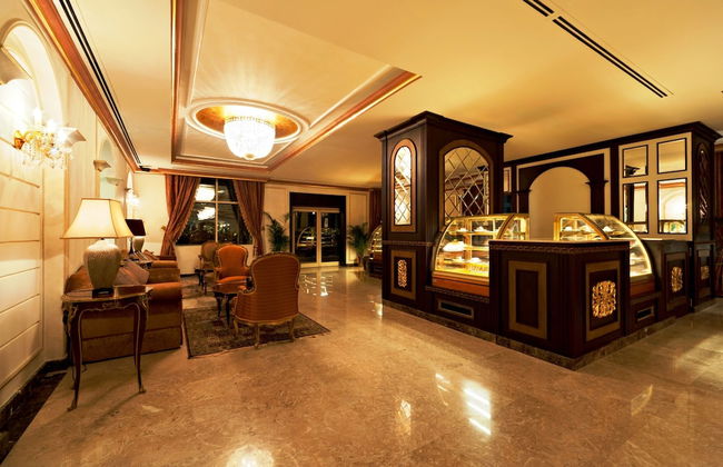 Magnum Hotel & Suites West Bay - Foto 32