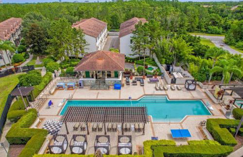 Cozy & Elegant 4BR Enchanted Townhouse - 1 Mile to Disney with Resort Pool, Gym, & Jacuzzi - Photo 74