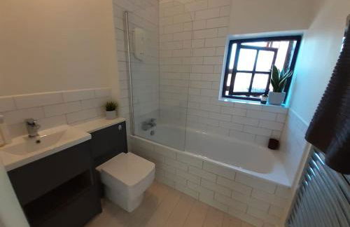 Light & Airy Vaulted Barn Conversion with a View - Photo 7