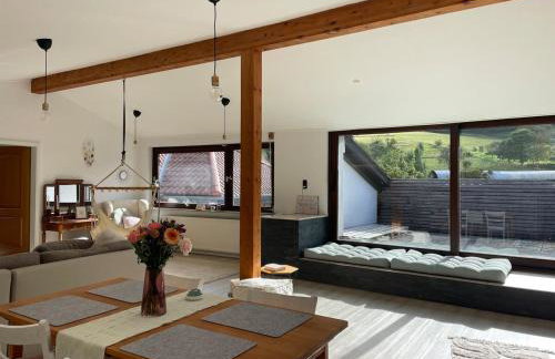 Dachwohnung mit Blick auf den Wagenberg - Foto 1