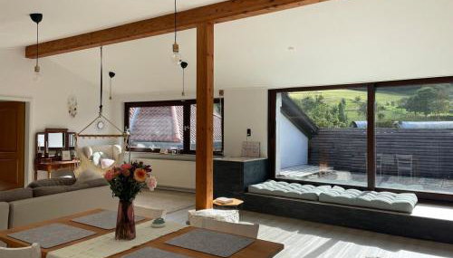 Dachwohnung mit Blick auf den Wagenberg - Foto 1