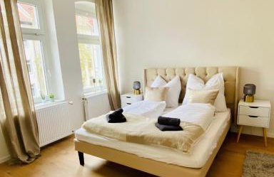 Modern eingerichtetes Apartment mit Balkon - Foto 6