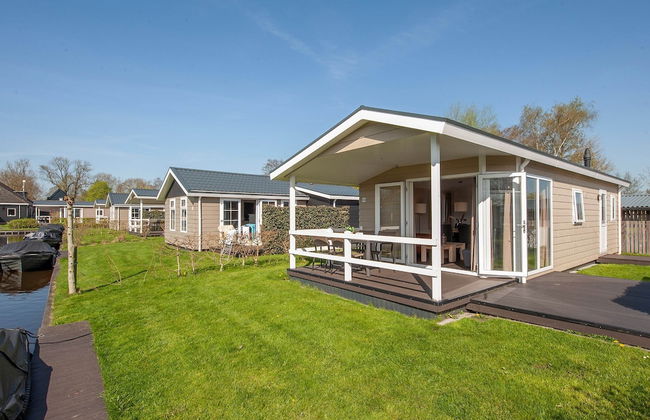 Lakeside Cottage With Boat - Photo 1