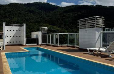Apartamento na Praia das Toninhas em Ubatuba 350m da praia -2 quartos sendo 1 suite, piscina, varanda gourmet com churrasqueira, ar condicionado, cozinha completa, duas garagens - Foto 14