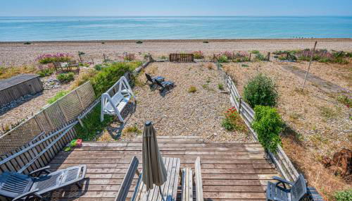 Pebble Paradise Beachfront Family Getaway - Foto 2, sunbed