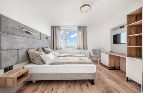 Exklusives Apartment Sunrise mit Whirlpool im 24-OG, Zugang zu Pool und Sauna - Foto 17