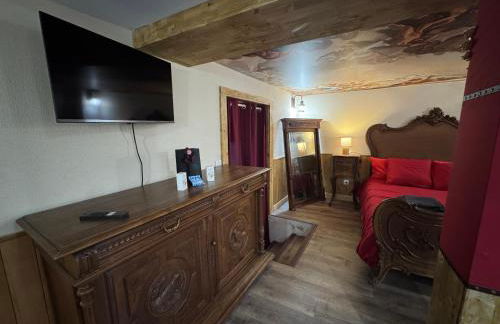 L'Alcôve Secrète Suite médiévale avec Spa - Foto 21