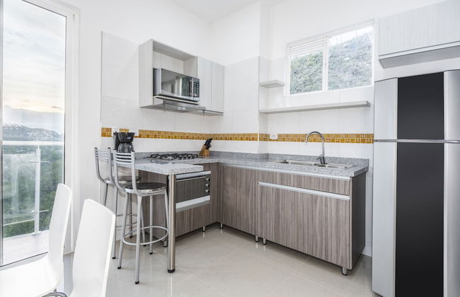 Terrazas Tayrona Travelers Apartamentos y Suites - Photo 21