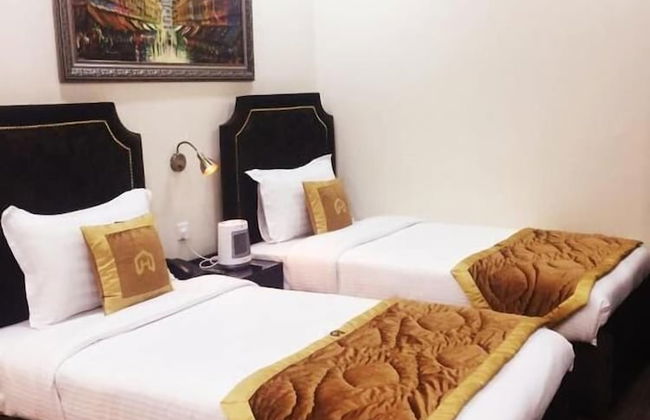 Alnoor Luxury Hotel Apartments - Photo 21