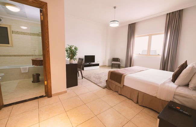 Magnum Hotel & Suites West Bay - Foto 9