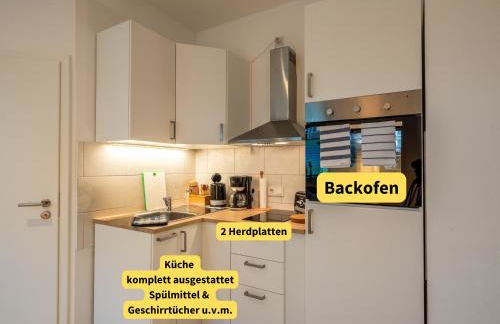 Holledau-Apartments - FeWo bis 5 Pers - getrennte Betten möglich - Vollausstattung - 24h Checkin - wöchentl Reinigung u Wäschewechsel - Waschmaschine u Trockner - WLAN - Minibar - XXL Parkplätze - Garten - ruhige Lage - Foto 32