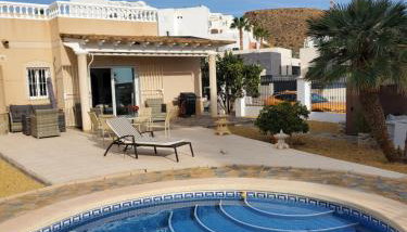 Chalet Athos, Ferienwohnung mit Pool,Dachterasse, Meer und Bergblick in San Juan de los Terreros - Foto 2, Garden, sunbed