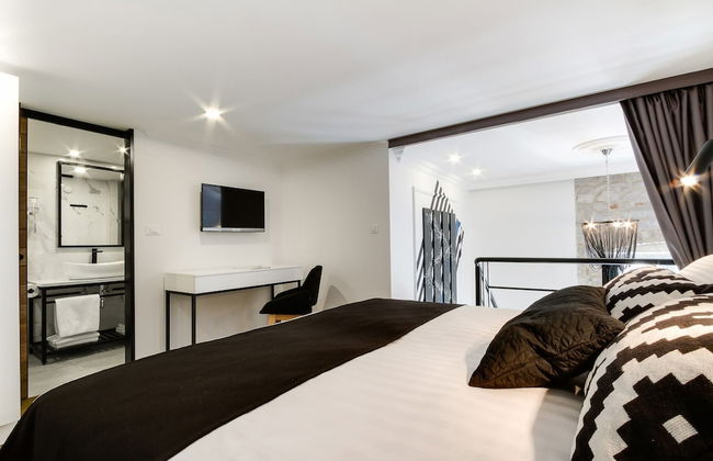 DeZign Apartments - Photo 12