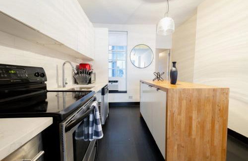 E10-1 Designer East Village Townhouse 1BR - Foto 32