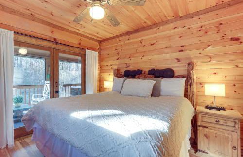 Secluded Cherry Log Cabin with Hot Tub and Swings! - Photo 11