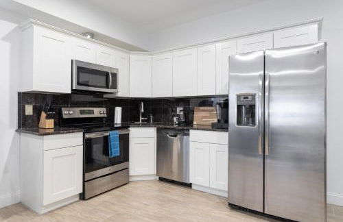 Cherry Suites 2BR Apt w W D Arcade Machine - Foto 4