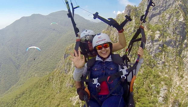 Having a great time paragliding