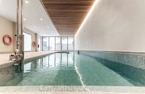 Lusciano - 2 bedrooms, pool and gym in Almagro - Photo 1