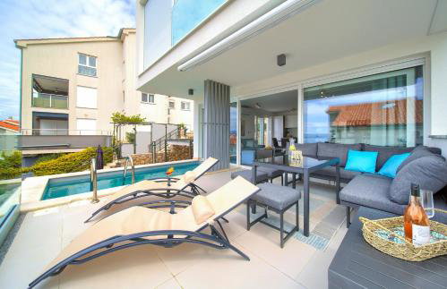 VILLA SOLIS LACUS modernes Apartment - privater beheizbarer Pool- Klimaanlage - private Parkplätze - Foto 35