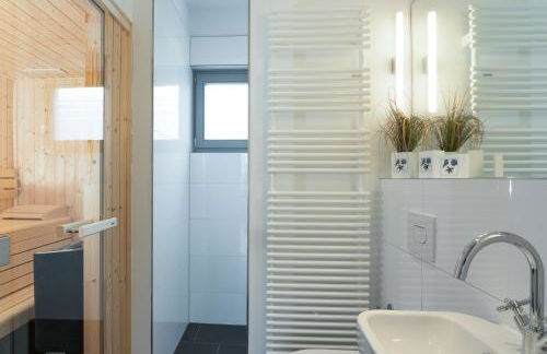 Ostsee - Reetdachhaus Nr 8 "Sonne und mehr" - mit Lademöglichkeit im Strand Resort - Foto 16