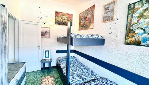 la farfalla blu sul mare - Foto 3