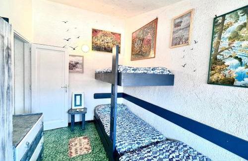 la farfalla blu sul mare - Foto 3