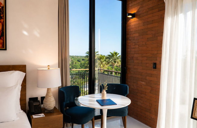 Flamboyan Hotel & Residences - Photo 19