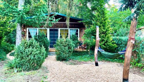 Holzhaus Bärenhöhle am Wald und See - Foto 2, Garden view