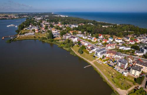 SOLEK, Apartamenty hotelowe i pokoje gościnne ze śniadaniem, przyjazne zwierzętom, wyjątkowe, z widokiem na Jezioro Jamno i w bardzo bliskiej odległości od morza - Foto 73