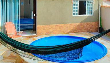 Casa Espaço Sara Piscina com total privacidade, área gourmet completa com churrasqueira fogão a lenha, a 5min do centro e do parque das águas - Foto 2