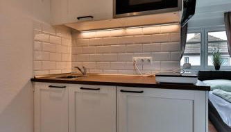 Kleines Apartment mit traumhaftem Seeblick, Ferienpark Seedorf Zeesenhaus Nr 4 - Foto 4, stove