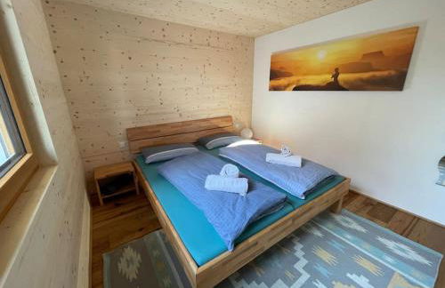 Zweistöckiges Natur-Holzhaus mit Berg- & Seesicht - Foto 18