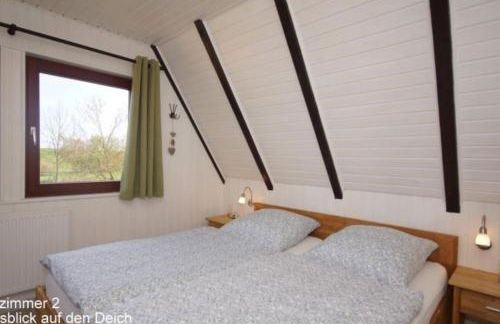 6 Personen Ferienhaus mit 4 Schlafzimmern, Infrarotwaermekabine, mit Blick auf den Weltschiffahrtsweg in Otterndorf - Foto 15