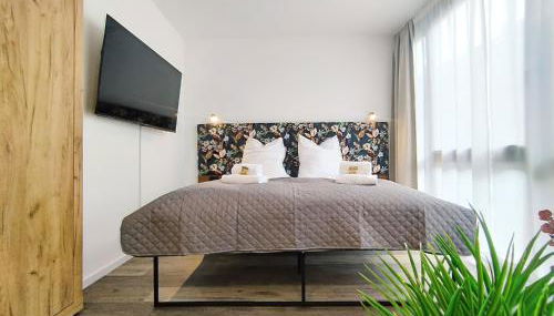 Design Apartment für bis zu 4 im 2 OG, modern, Dachterrasse, Grill, ruhige Lage, Disney plus, Wii, LAN und WLAN - Foto 4