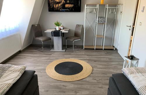 -Fewo Benz- Exklusive Ferienwohnung im Stadtzentrum von Wittenberge Modernes Ambiente, 3 Einzelzimmer für bis zu 6 Gäste - voll ausgestattet mit Waipu-TV und High-Speed-WLAN Bettwäsche und Handtücher inklusive! - Foto 7