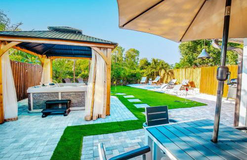 Coastal Farmhouse with mini Golf, Private Beach &Spa - Photo 13