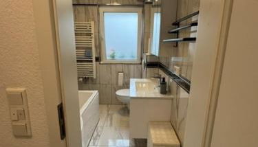 Moderne Erdgeschosswohnung und eigenem Garten für bis zu 4 Personen - Foto 3