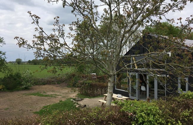 In het huis van Jo Daggert - Foto 1