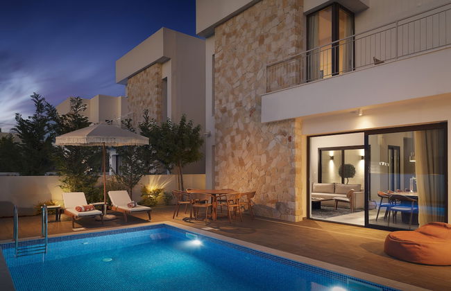 LIV & CO SUITES & VILLAS - Photo 1