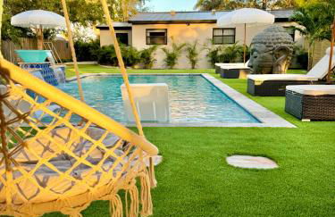 Bali Inspired home with Heated Pool, Sauna and Hot Tub! Close to Beach and Atlantic Ave - Photo 11