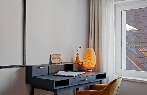 MAISUITES Eisvogel - Zentrale Luxuswohnung mit direktem Seeblick I Bis 4 Personen I Premiumküche I Boxspringbett I Kaffeevollautomat I Parkplatz I Barrierearm & Aufzug - Foto 28