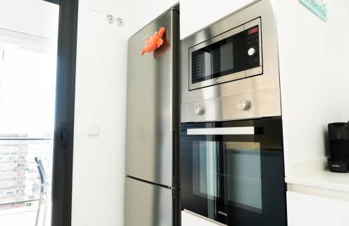 Apartamento nuevo junto al mar con plaza de garaje!! Perfecto para familias - Photo 18