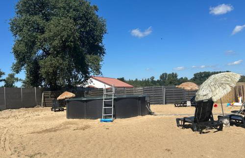 Domek nad jeziorem Wilczyńskim dla czterech osób, sypialnia z łożem małżeńskim oraz salon z rozkładanym narożnikiem - Photo 16