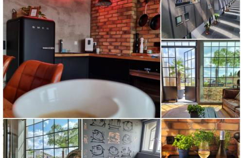 Wohnen im Industriedenkmal mit Dachterrasse - Foto 1