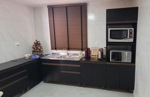 Casa da Sil com garagem, ar, wifi, perto Expocentro - Foto 5