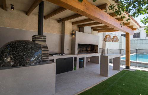 Villa con barbacoa para familias - Foto 11