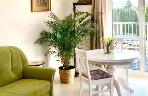 Gemütliche Wohnung mit Sonnenterrasse im blauen Holzhaus - Foto 7