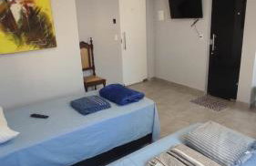 Kitnet independente 2 camas bem localizada - Foto 6